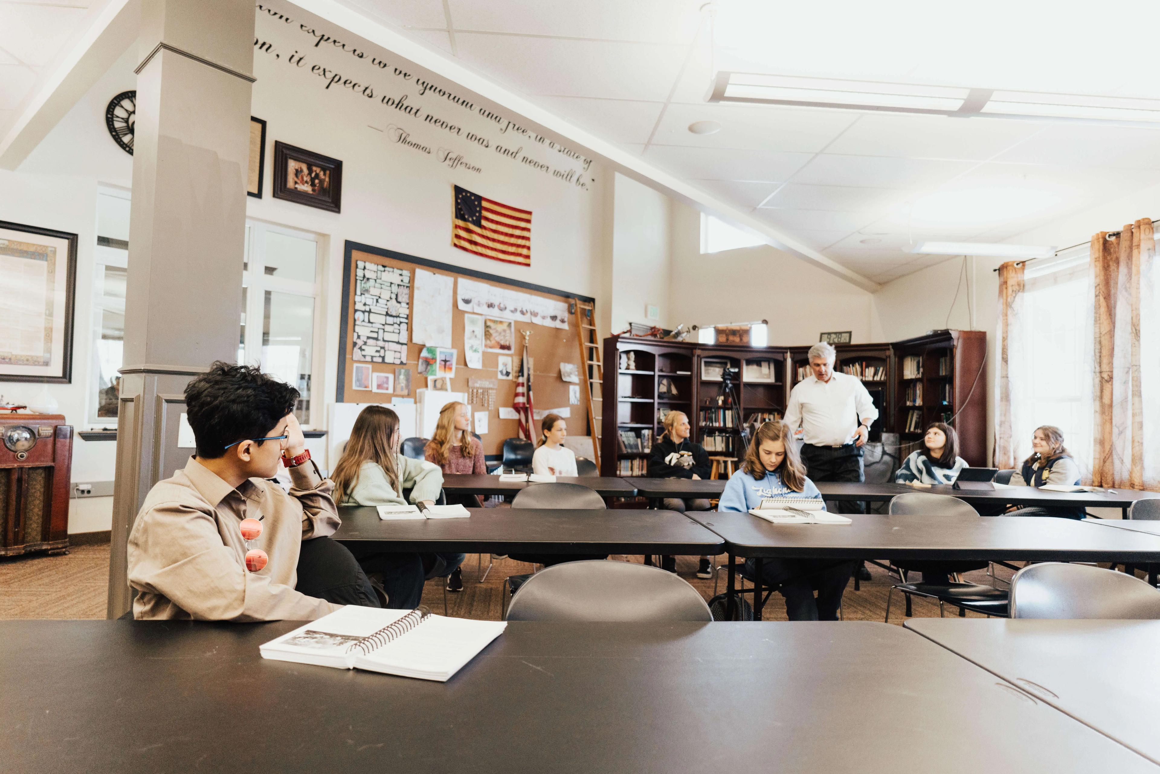 Liahoan Preparatory Academy Teacher, instructing a class